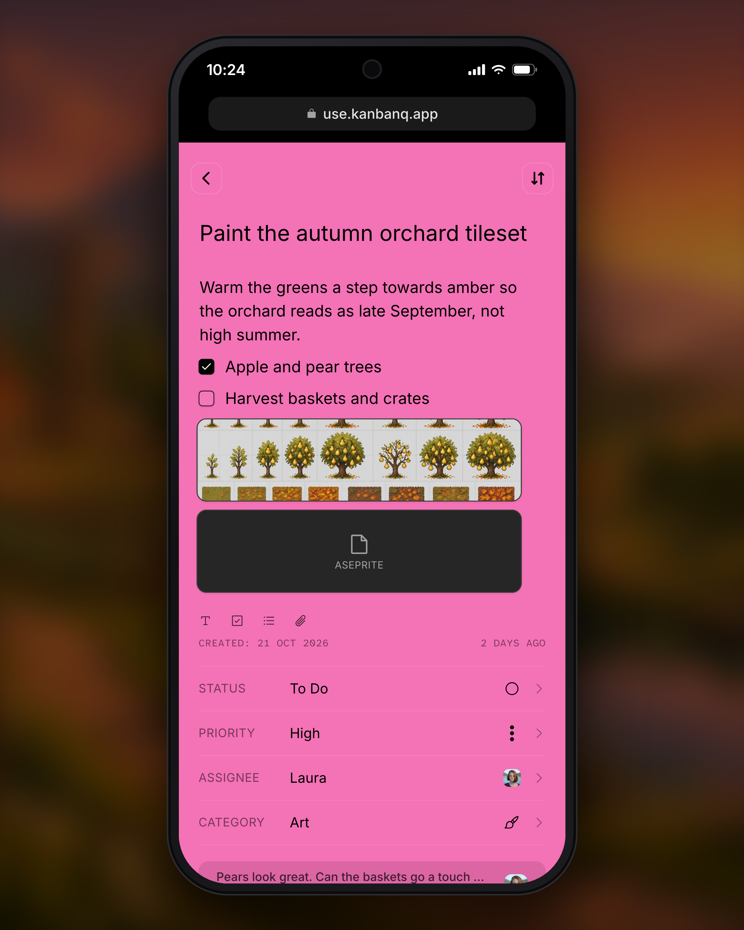 A Kanbanq task card opened full screen on a phone, filled with its pink Art colour, with a note, a checklist, an image and a file